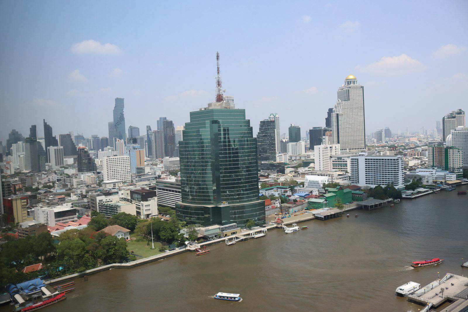 Chao Phraya River and Bangkok office towers on a clear day