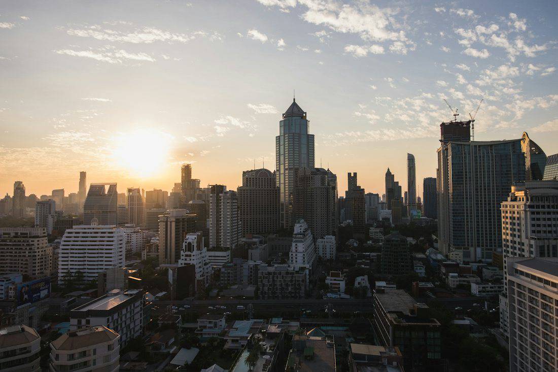 Sun setting behind the Bangkok skyline