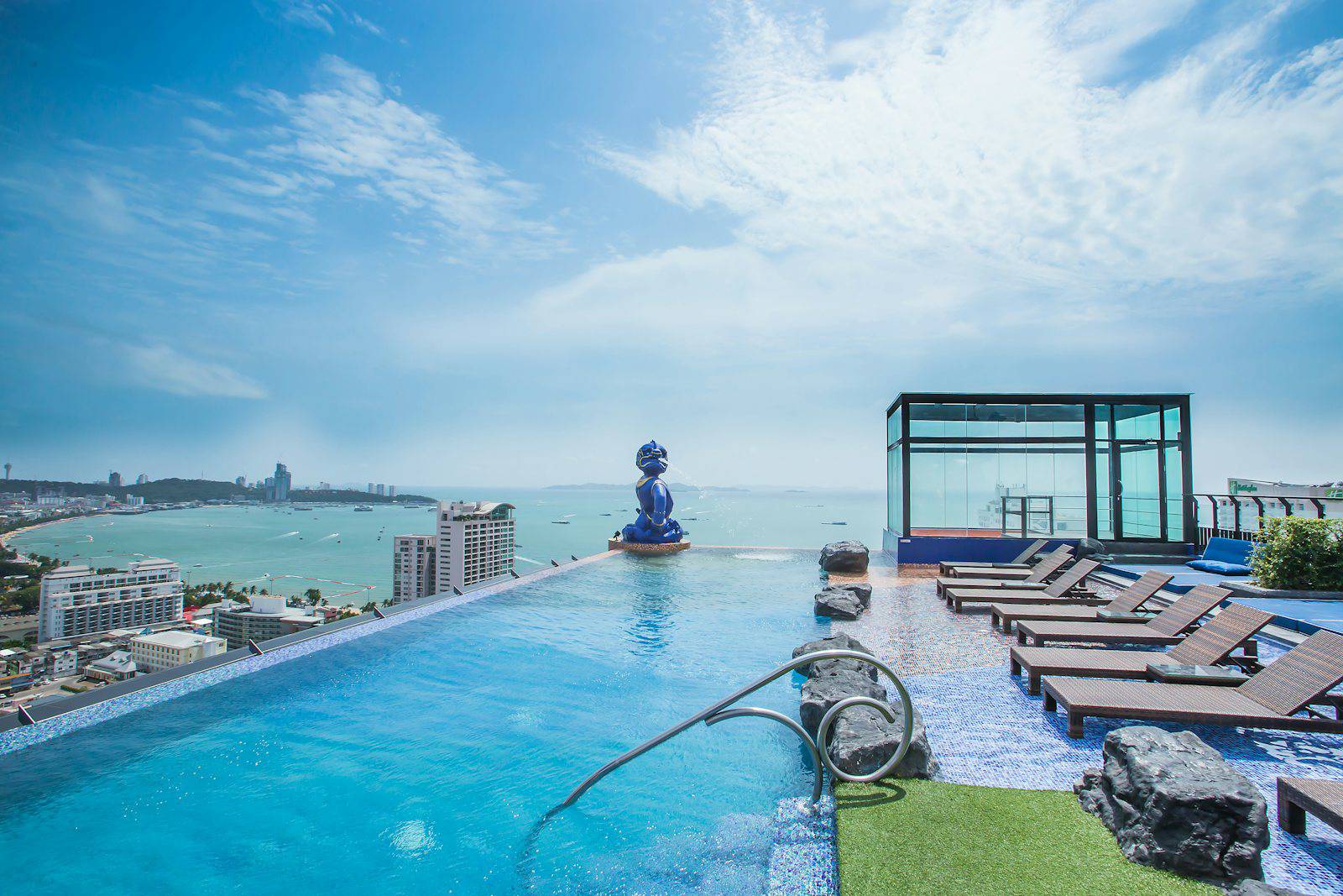 Rooftop hotel pool overlooking Pattaya Bay