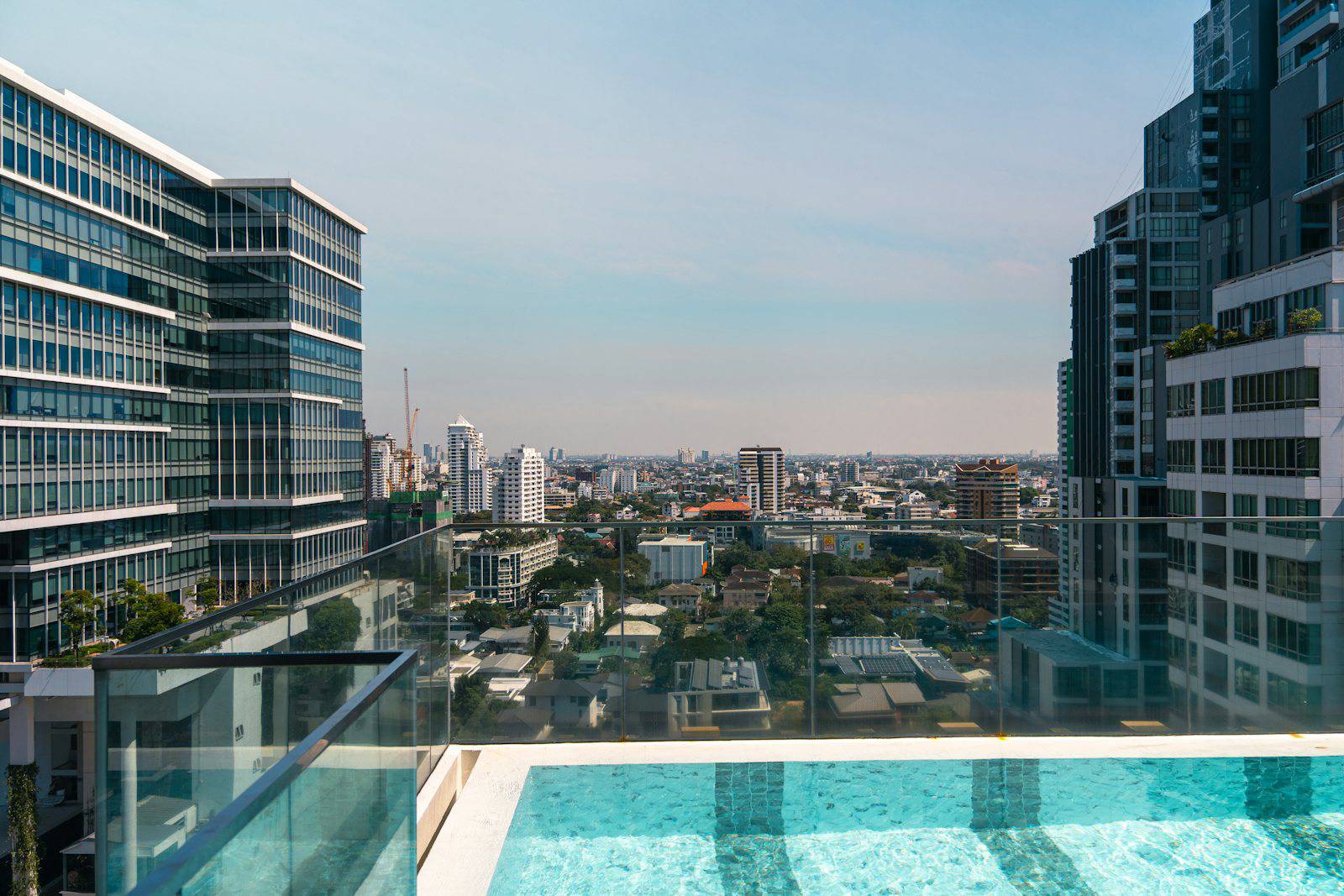 Rooftop pool overlooking the Bangkok skyline