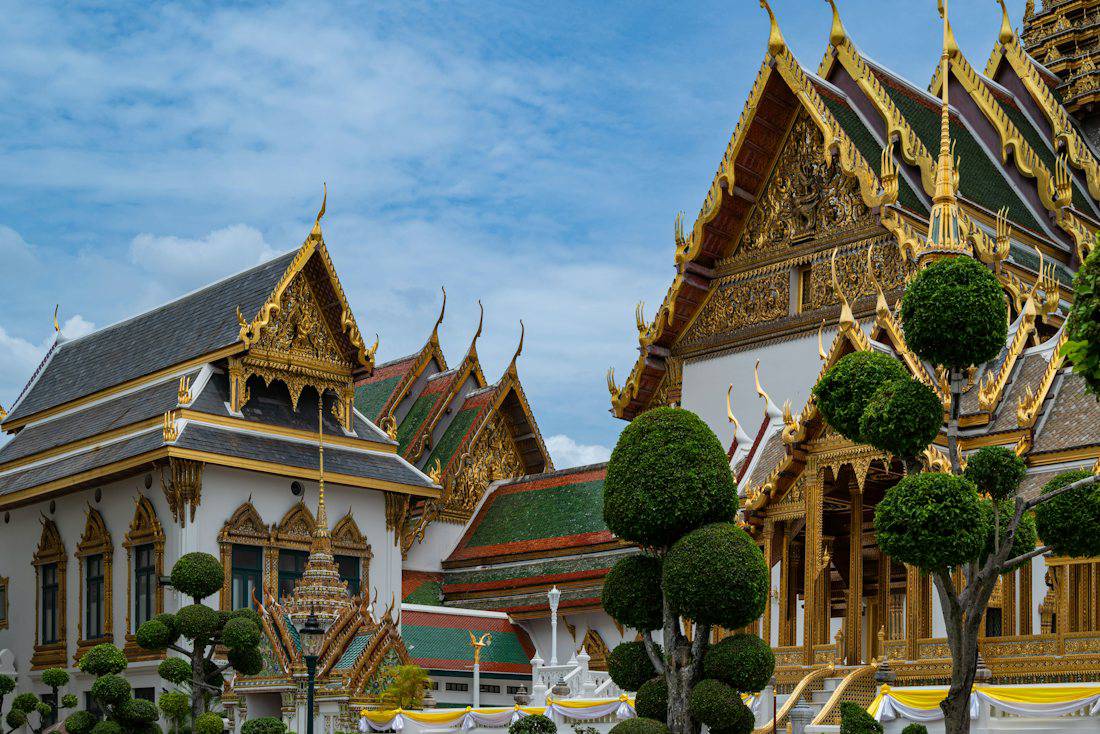 Ornate temple buildings inside the Grand Palace in Bangkok