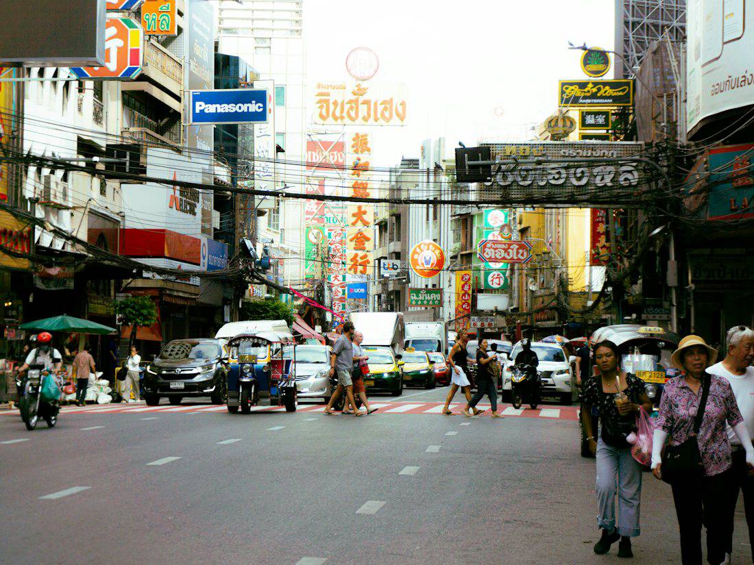 A busy city street filled with lots of traffic