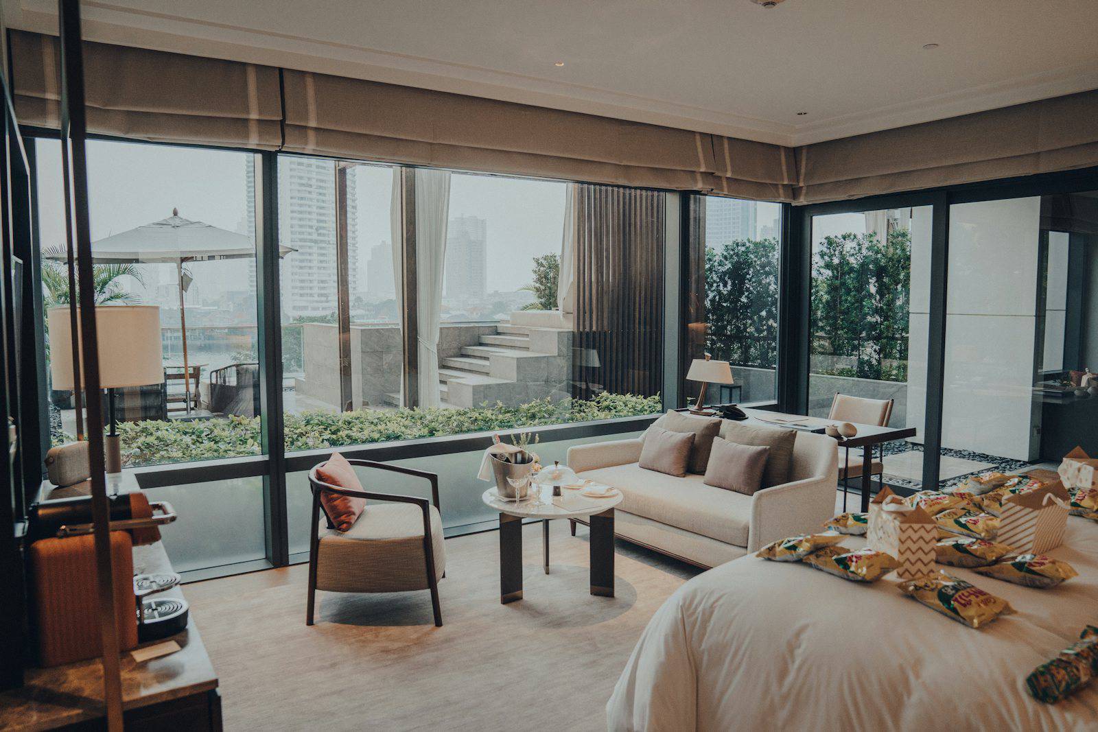 Luxury Bangkok hotel suite with floor-to-ceiling windows