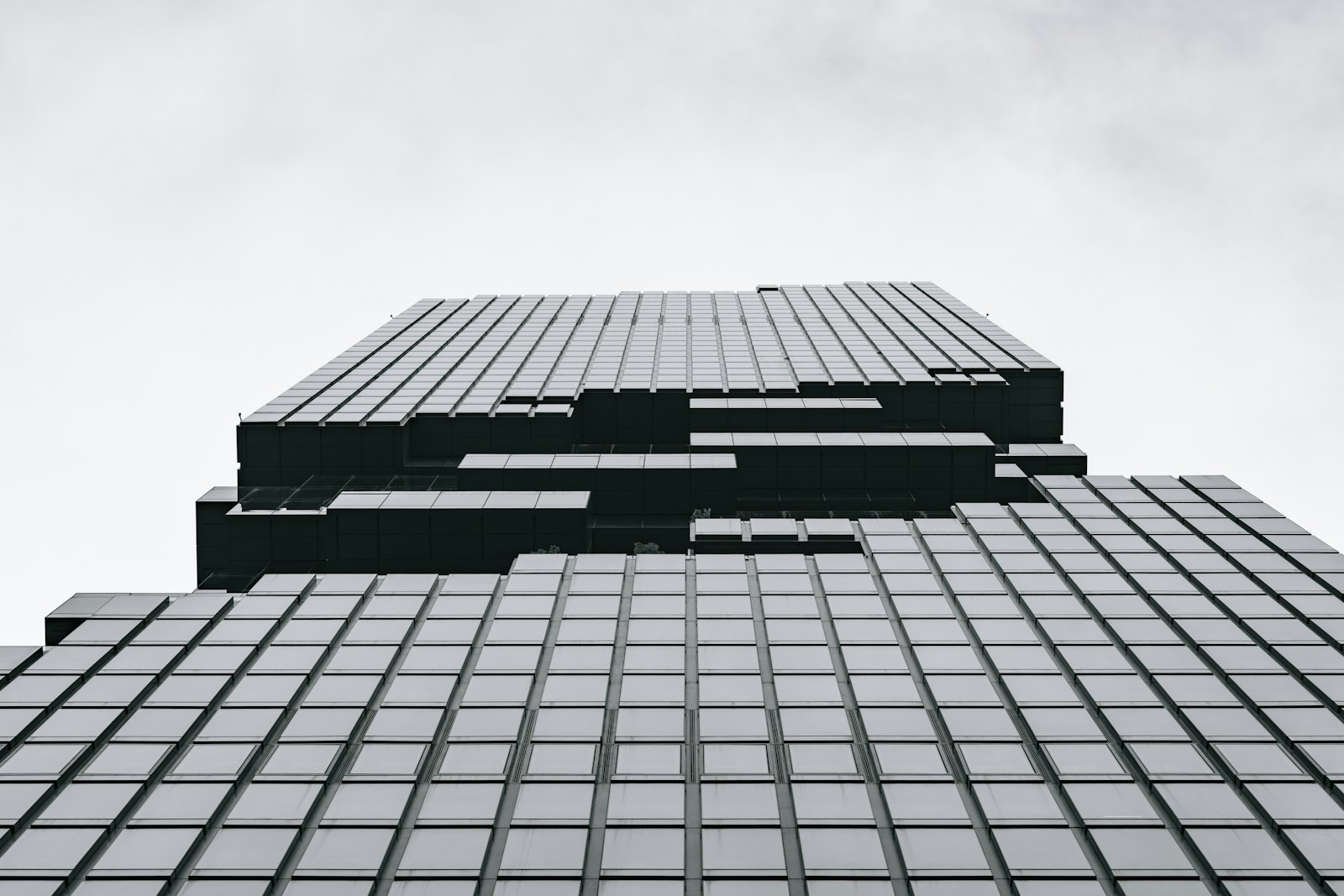 The pixelated glass facade of the King Power MahaNakhon tower in Bangkok