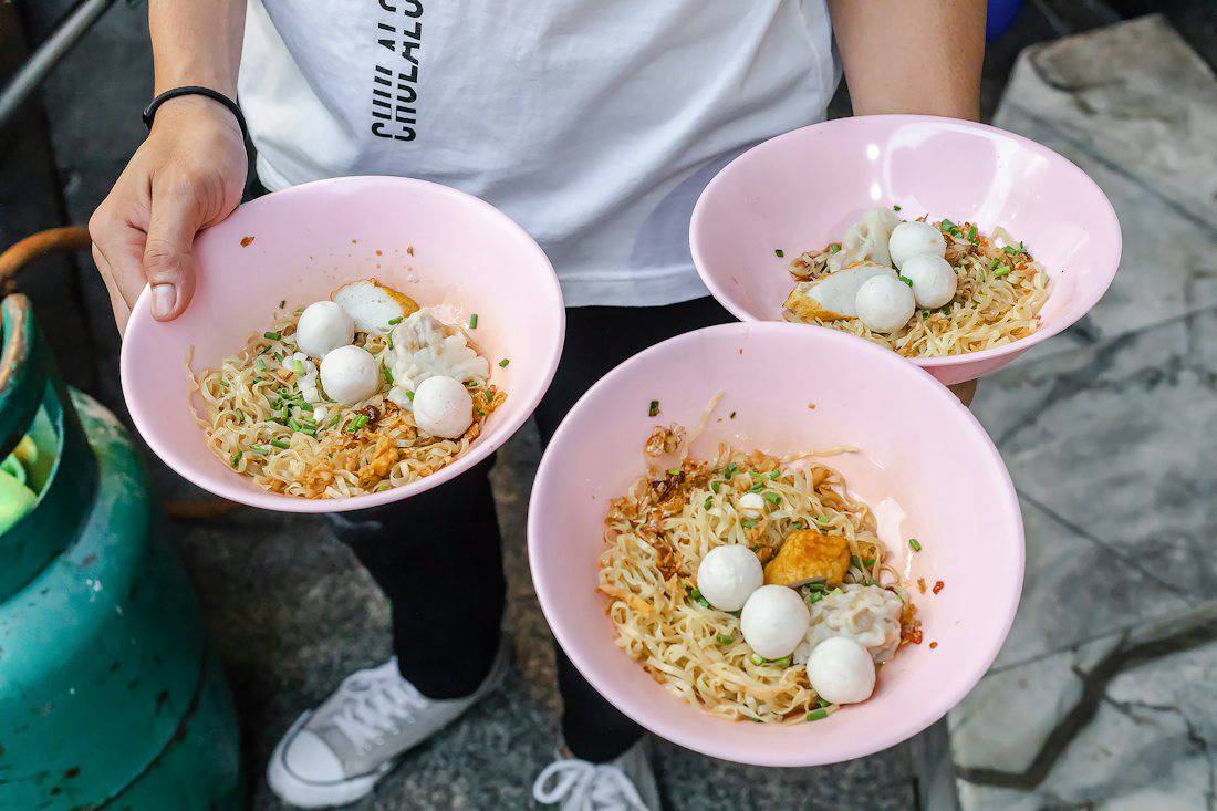 Bowls of Thai noodles served at a Bangkok street stall