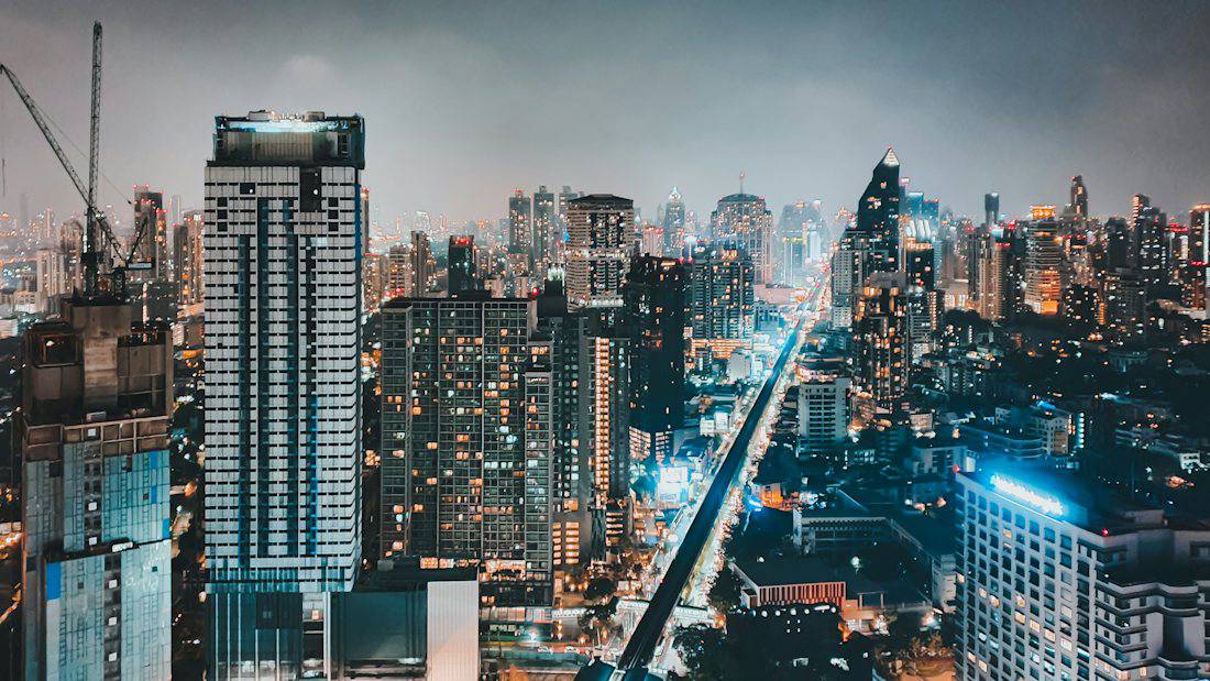 Sukhumvit towers and roads at night in Bangkok