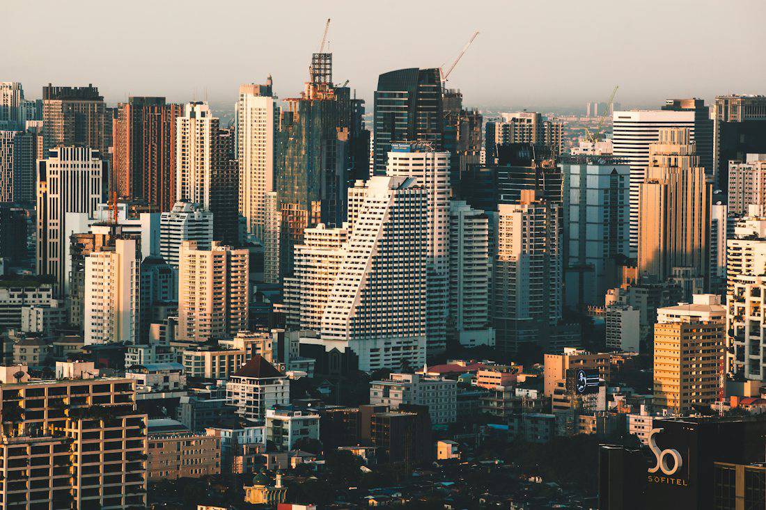 Dense cluster of towers in central Bangkok